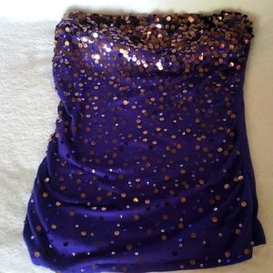 Woman's purple and bronze seqin blouse. This is a size small made by Express.